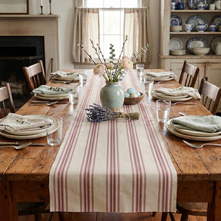 Close-up of blue stripe paper table runner roll showing grain sack pattern texture