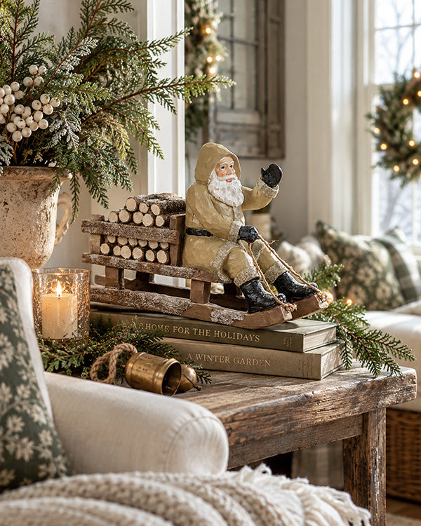 Cottage Core Tan Sledding Santa Figurine