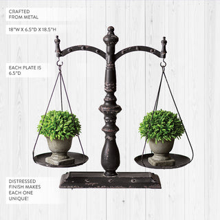 Distressed metal balance scale centerpiece with hanging planters