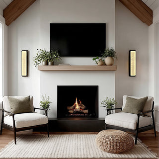 Contemporary wall lighting fixtures creating ambient glow near fireplace