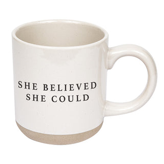 White mug with 'She believed she could' text