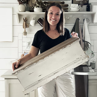 Woman holding distressed farmhouse wooden shelf