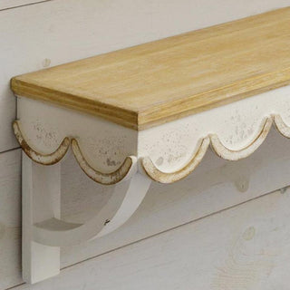 Close-up scalloped wood shelf detail