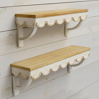 Rustic scalloped wooden shelves mounted on wall