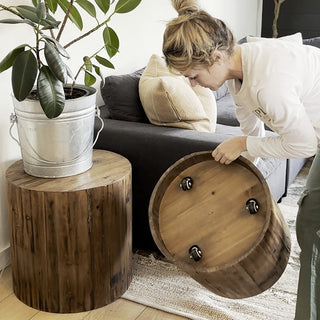 Wooden drum side table with wheels underside view