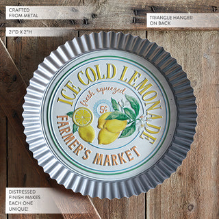 Round corrugated metal lemonade sign with embossed vintage details and triangle hanger