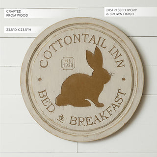 Full view of distressed ivory Cottontail Inn wood sign showing 23.5 inch diameter dimensions wood material and brown bunny design farmhouse Easter wall art