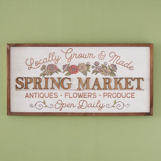 Full view of Locally Grown Spring Market farmhouse wood sign with walnut frame and whitewashed background on sage wall