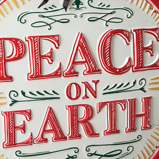 Detailed view of Peace on Earth red typography with decorative scrollwork flourishes on cream background
