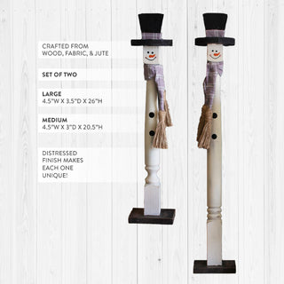 Product dimensions and specifications for tall wooden snowman figurine set showing 26 inch and 20.5 inch heights