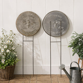  Antiqued finish bee garden stake with embossed pollinator design