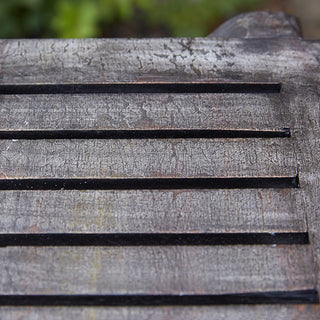 Close-up distressed wood slatted shelf texture detail
