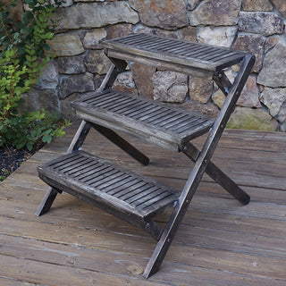 Dark wood three-tier plant stand outdoor display unit