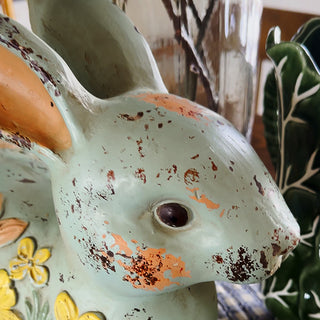 Close-up distressed bunny figurine shabby chic accent