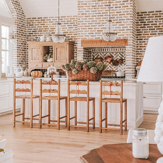 Farmhouse kitchen island seating four reclaimed wood bar stools brick backsplash