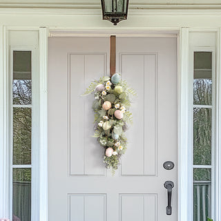 Easter egg door swag on white front door