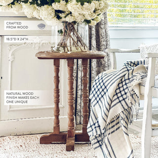 Small round wood side table with turned legs