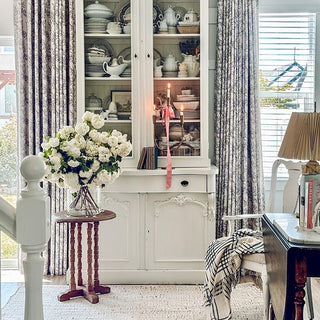 Small round wood side table with turned legs