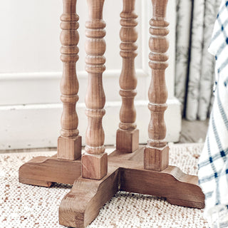 Small round wood side table with turned legs