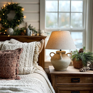 Farmhouse ceramic table lamp on cozy bedroom nightstand