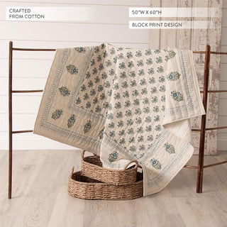 Block print cotton throw displayed on wooden ladder showing full 50x60 design with floral border pattern