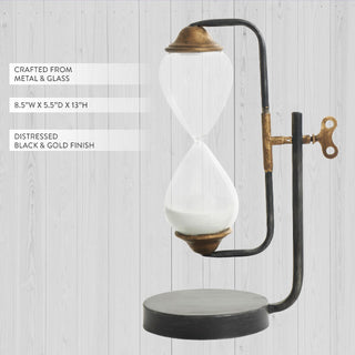 Glass sand timer with distressed black and gold finish showing dimensions