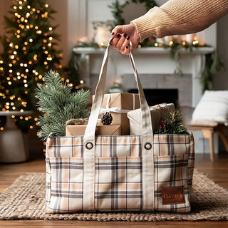Gather plaid cotton tote bag filled with wrapped Christmas presents and greenery in holiday living room