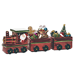 Side view of complete Santa's holiday express train set showing engine, gift-filled middle car, and tree-topped caboose with detailed hand-painted Christmas elements