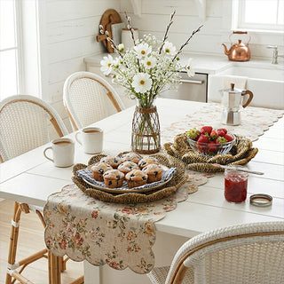 Natural seagrass serving trays with scalloped edges on farmhouse breakfast table