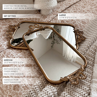 Set of two antique gold mirrored serving trays