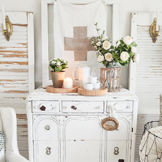 Rustic farmhouse dresser styled with wooden trays decor