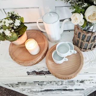 Wooden trays with candle teapot farmhouse vignette