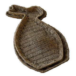 Single woven seagrass bunny shaped tray showing full silhouette with ears and body shape