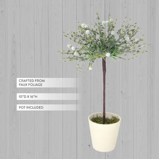 Close-up of delicate white flowers and eucalyptus-style green stems on faux topiary tree