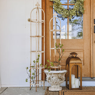 Set of three metal garden obelisk trellises