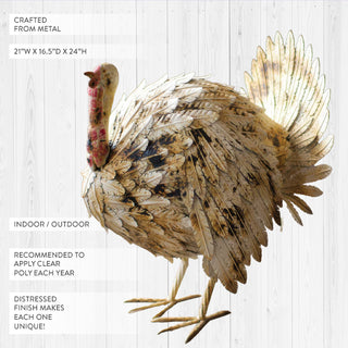 Distressed metal turkey sculpture with detailed feathers