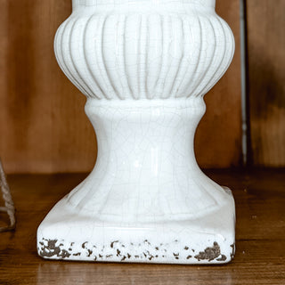 Close-up distressed crackle ceramic urn planter