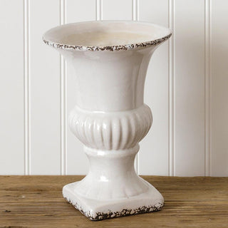 White ceramic urn with red flowers farmhouse shelf decor