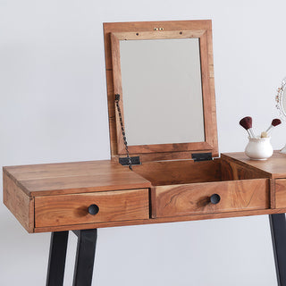Close-up of mango wood vanity desk flip-up mirror open showing chain support system hidden storage compartment and natural wood grain detail