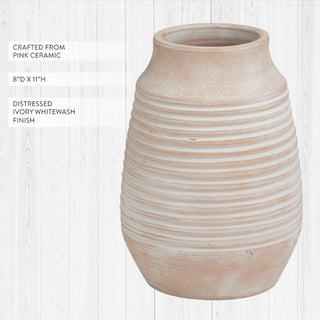 Ribbed pink ceramic vase with distressed ivory finish and measurements