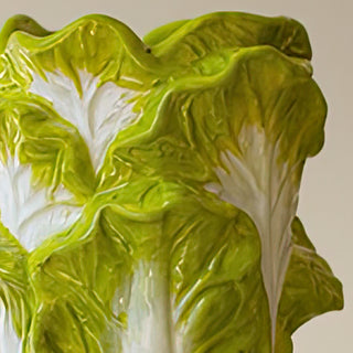 Close-up of ceramic lettuce vase with detailed green and white leaf texture for farmhouse kitchen decor