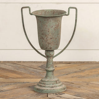 Narrow distressed metal pedestal urn vase