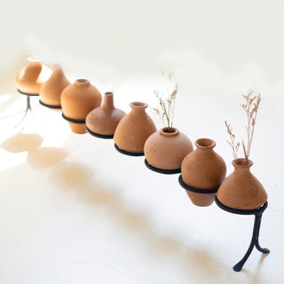 Full view of 8-vessel collection showing 24-inch width and sculptural arrangement