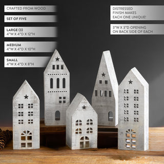 Five distressed white wooden Christmas village houses showing detailed dimensions and star cutout features with architectural variety