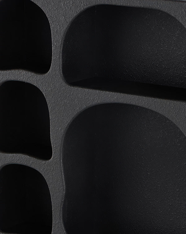 Textured Black Wall Shelf with Arched Shelving Design