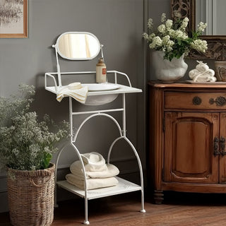 White vintage metal washstand with basin and tilting mirror in elegant bathroom setting