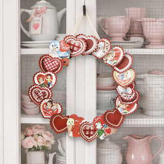 Vintage Valentine heart wreath on kitchen cabinet