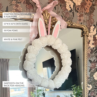 White and pink bunny pom pom wreath hanging