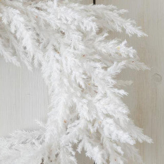 Detailed texture of white dried pampas grass plumes with natural variation