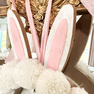 Pink and white felt bunny ears wreath detail


